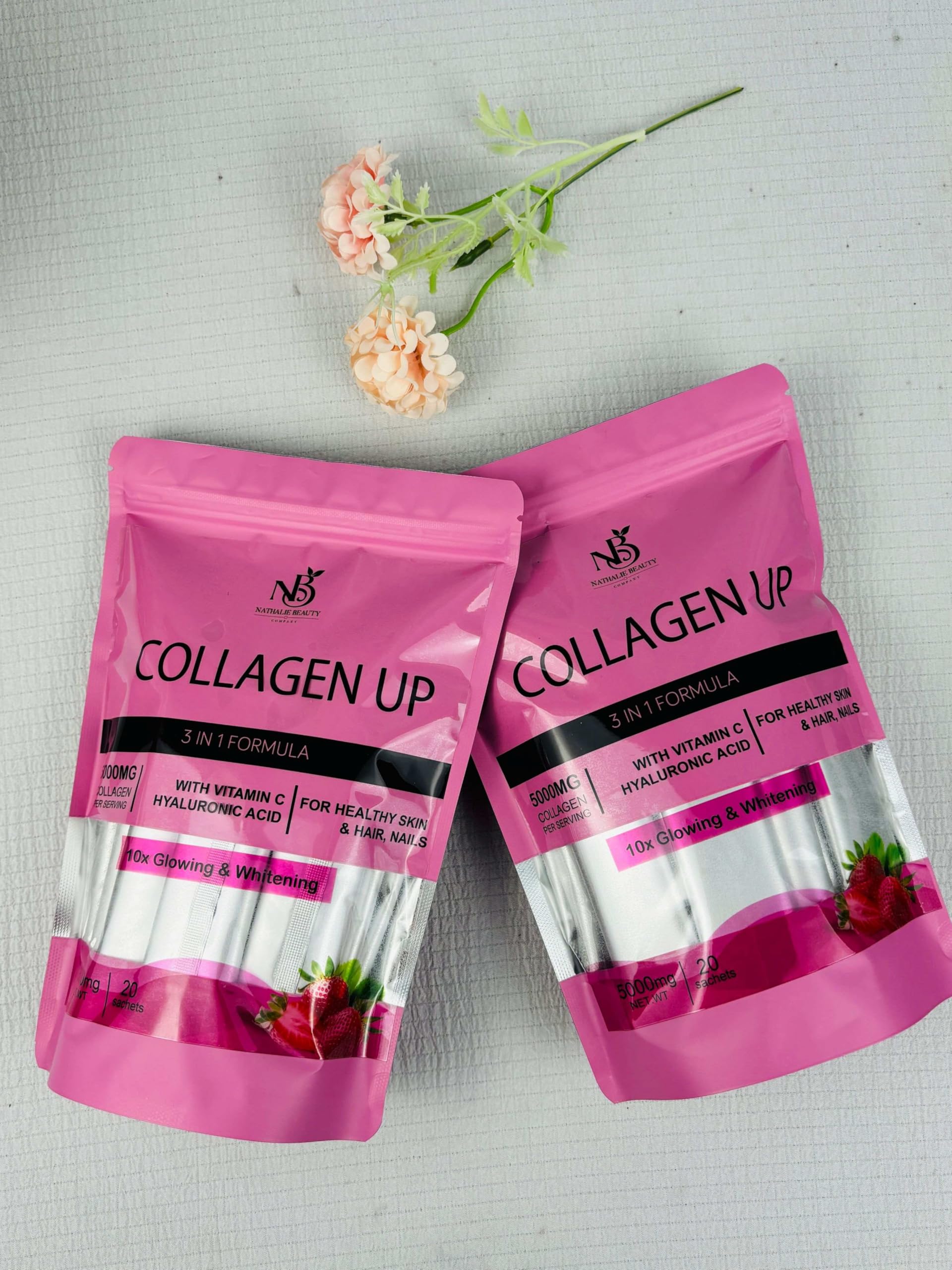 Nathalie Beauty Collagen Up bottle close-up highlighting hyaluronic acid