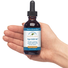 Epi-Still-M bottle on desk with dosing spoon for easy use.
