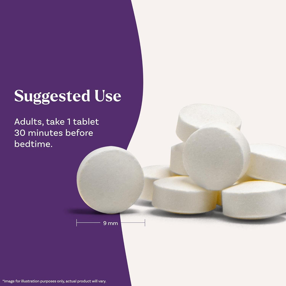 Natrol melatonin bottle beside water glass for bedtime routine.