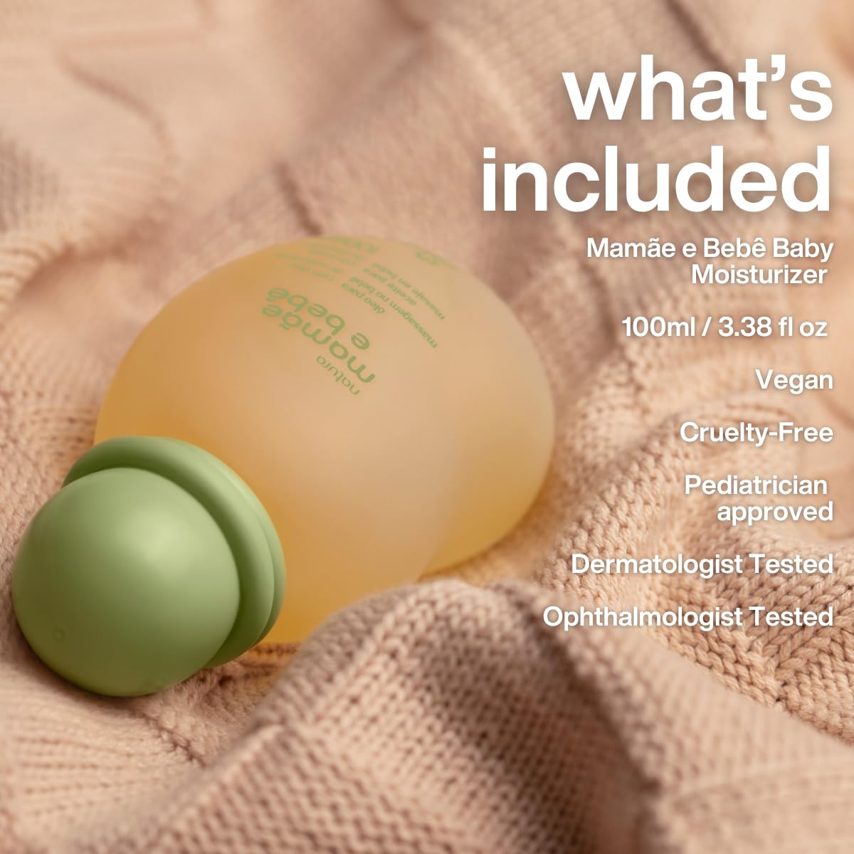 Parent hands massaging baby's skin with Natura Baby Massage Oil.