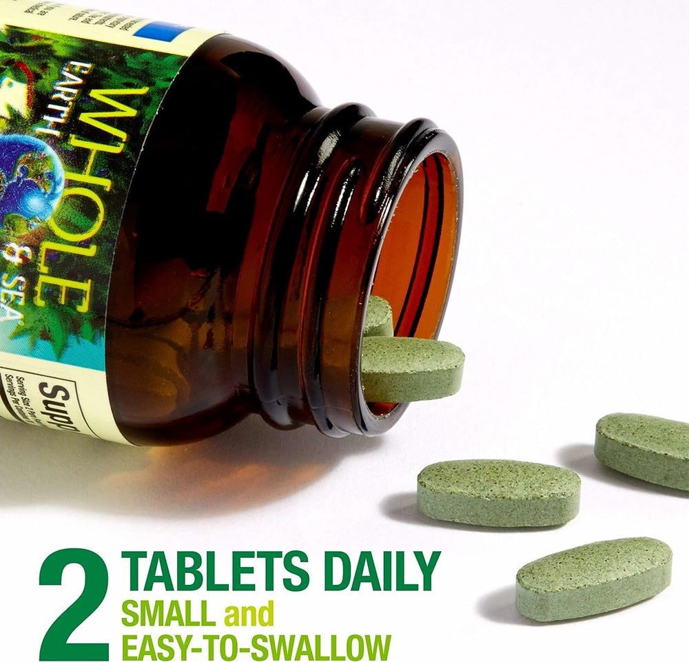Natural Factors Prenatal bottle open with tablets spilled, convenient daily supplementation on the go