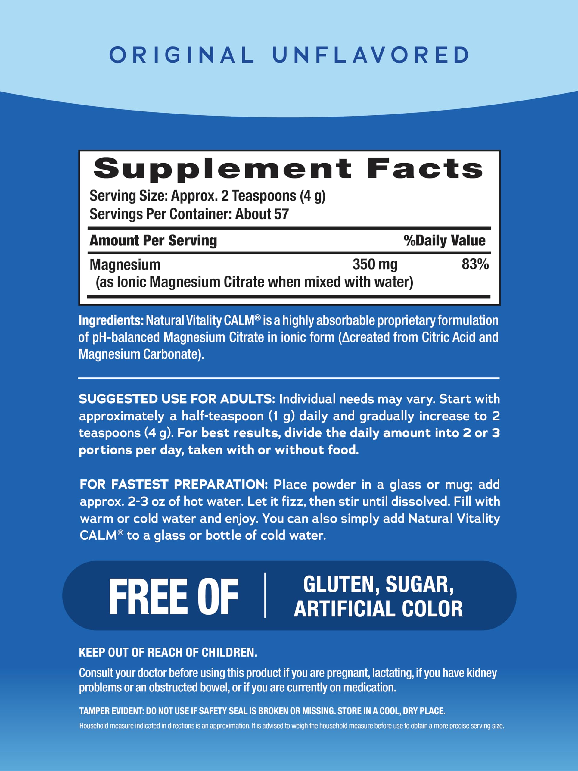 Scoop of Natural Vitality Original Calm magnesium powder next to a glass for easy hydration.