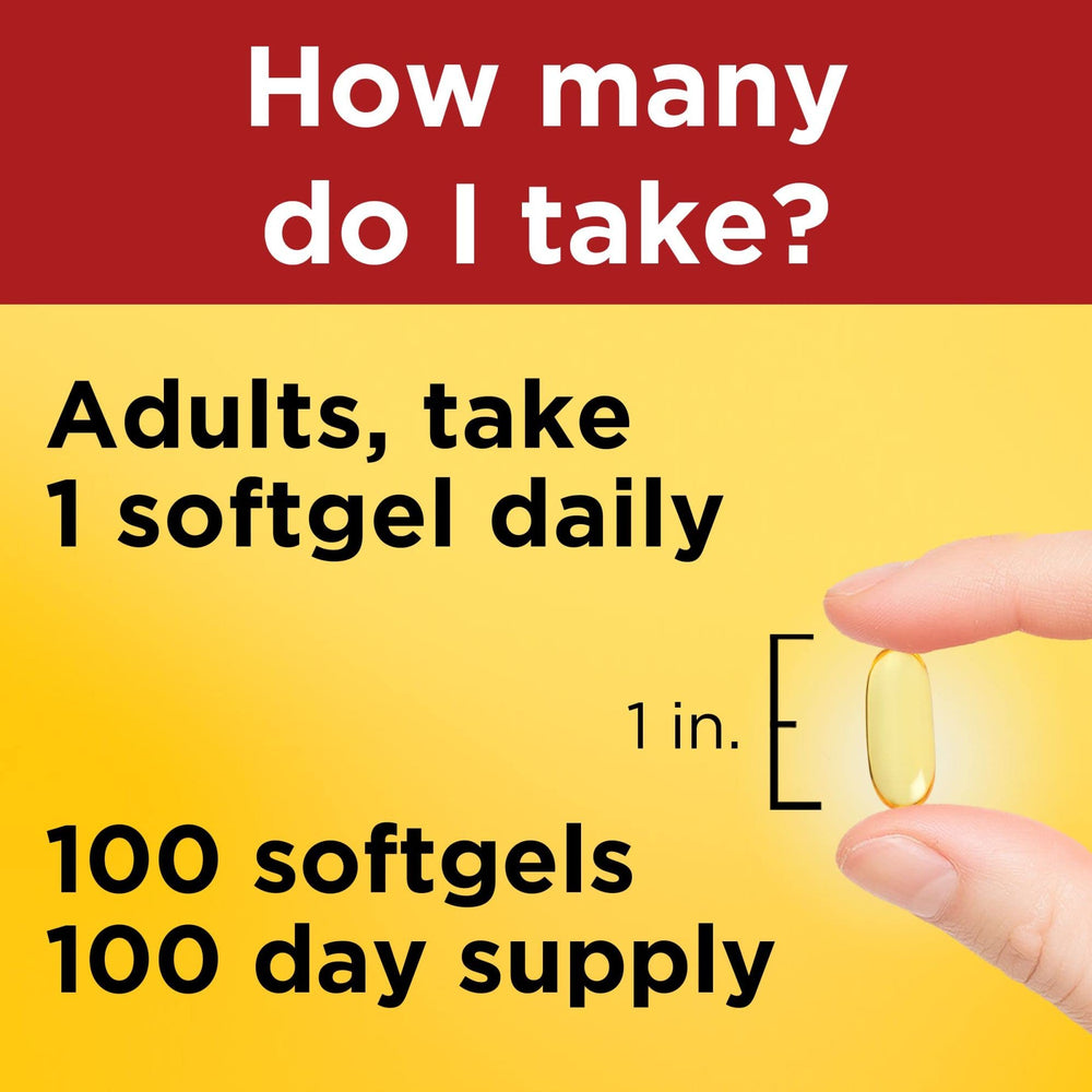 Person takes one Nature Made Omega-3 softgel with water during a meal