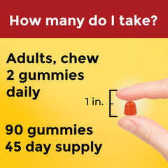Nature Made Fish Oil Gummies bottle and gummies on kitchen counter.