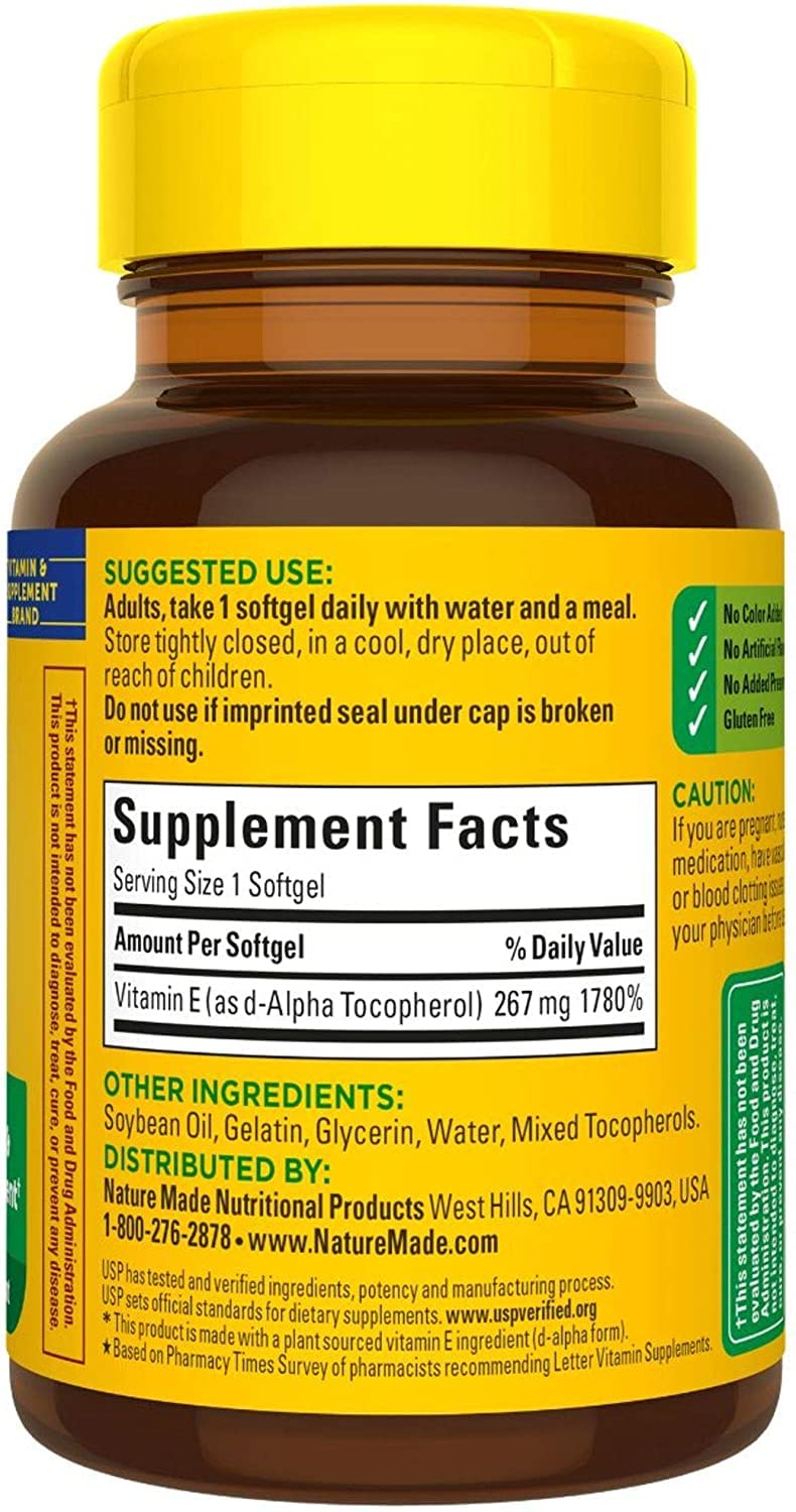 Nature Made Vitamin E softgels poured into hand for easy daily dose