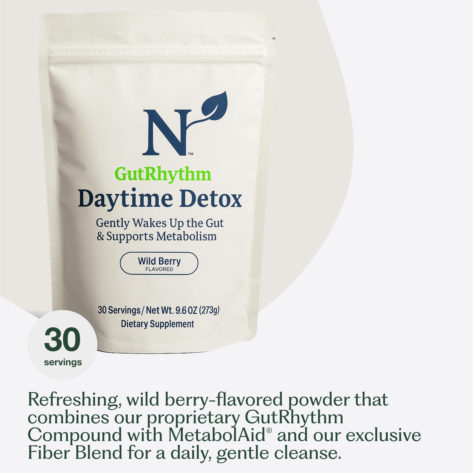 Nature M.D. GutRhythm daily scoop beside a glass ready for daily use.