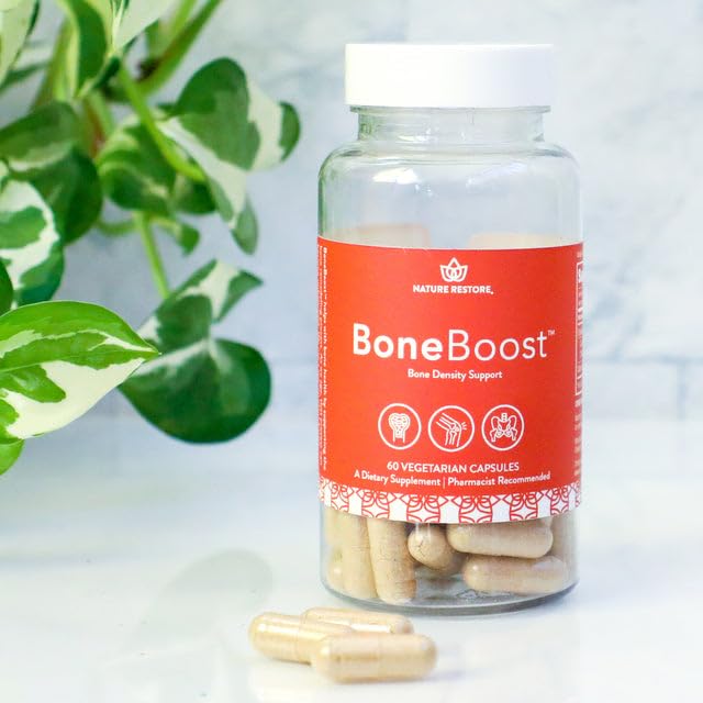 Nature Restore BoneBoost capsules pictured ready for daily supplement routine.