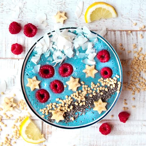 Naturegrail Blue Spirulina powder stirred into latte for a playful blue sip.