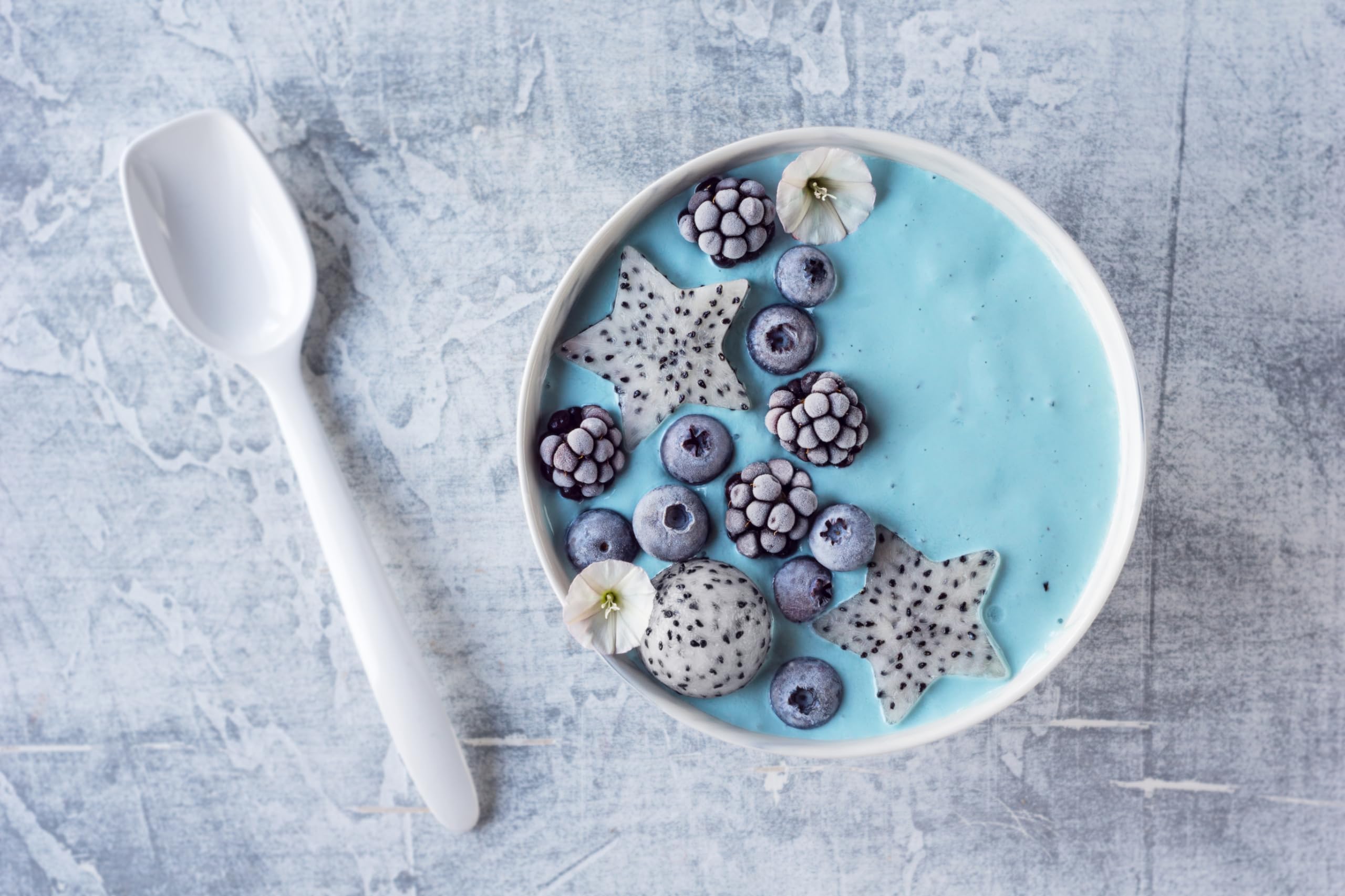 Naturejam Blue Spirulina powder in muffins for colorful baking.