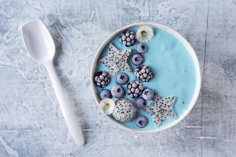 Naturejam Blue Spirulina powder in muffins for colorful baking.