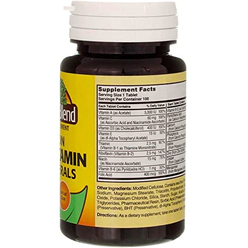 Nature's Blend daily routine tablets with a glass of water.