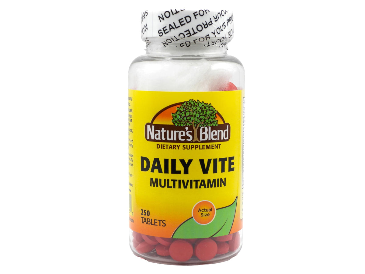 Nature's Blend Daily Vite 250 tablets bottle on kitchen counter supports daily wellness for busy mornings.