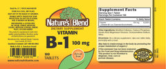 Nature's Blend Vitamin B-1 100mg tablets close-up showing small, round pills for daily use.