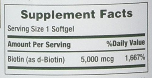 Close-up of Nature's Bounty Biotin 5000 mcg bottle, daily use