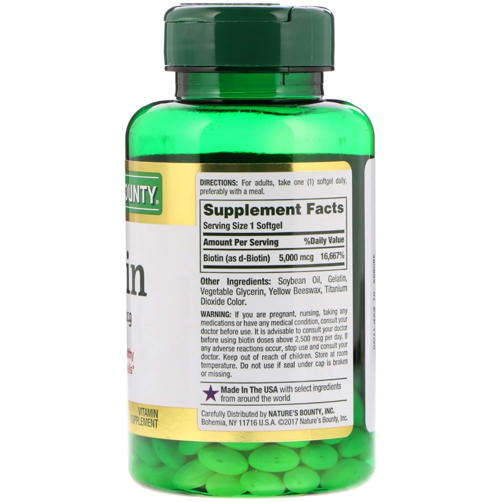 Nature's Bounty Biotin 5000mcg bottle back-label detailing dosage for energy metabolism and hair health