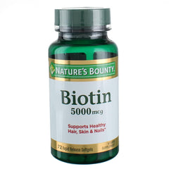 Nature's Bounty Biotin 5000 mcg bottle close-up, three-pack for daily support.