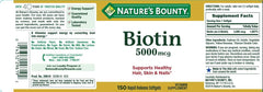 Nature's Bounty Biotin 5000mcg softgels close-up showing capsule texture and daily hair health support
