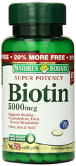 Nature's Bounty Biotin 5000 mcg softgels on white background, supports energy metabolism.