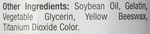 Nature's Bounty Biotin softgel capsules in hand for daily routine.