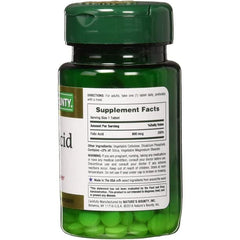 Nature's Bounty folic acid tablets close-up shows maximum strength 800 mcg per tablet