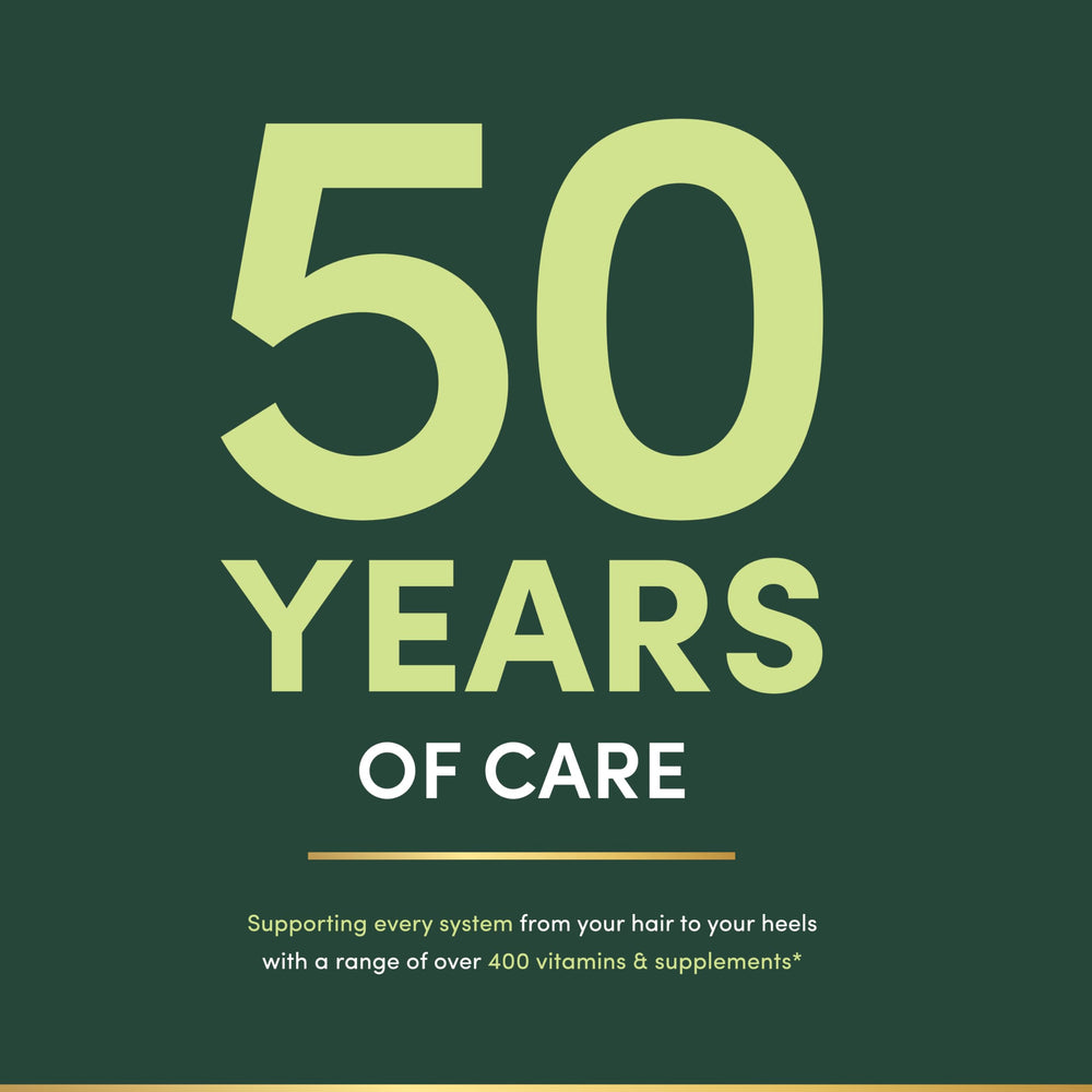 Nature's Bounty Gentle Iron in kitchen scene for daily wellness routine.