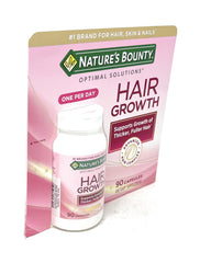 Nature's Bounty Hair Growth capsules close-up for daily hair health support.