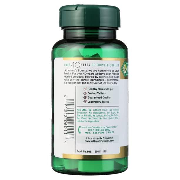 Nature's Bounty L-Lysine 1000 mg bottle open with capsules spilled for daily supplementation.