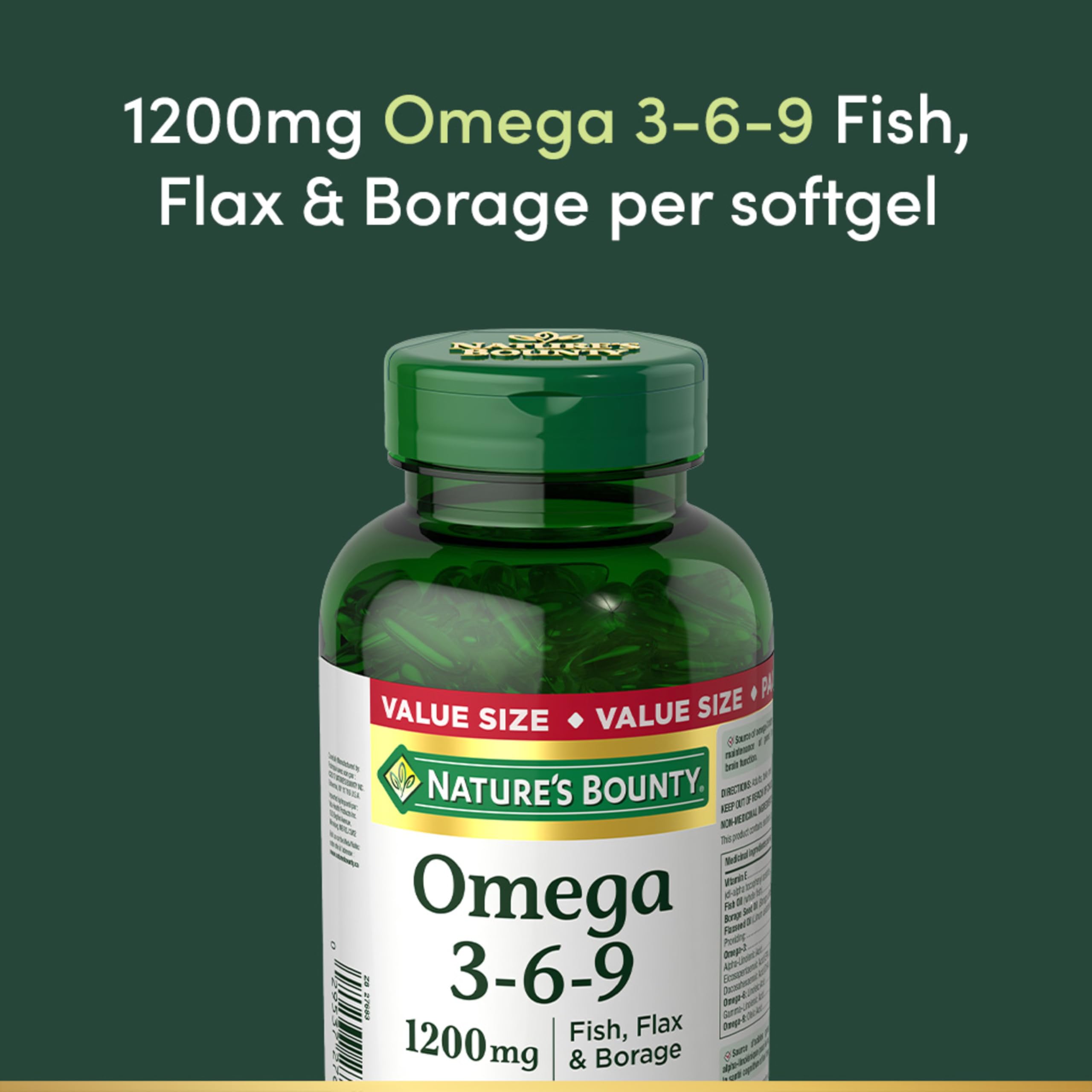 Nature's Bounty Omega-3-6-9 softgels in glass with bottle.