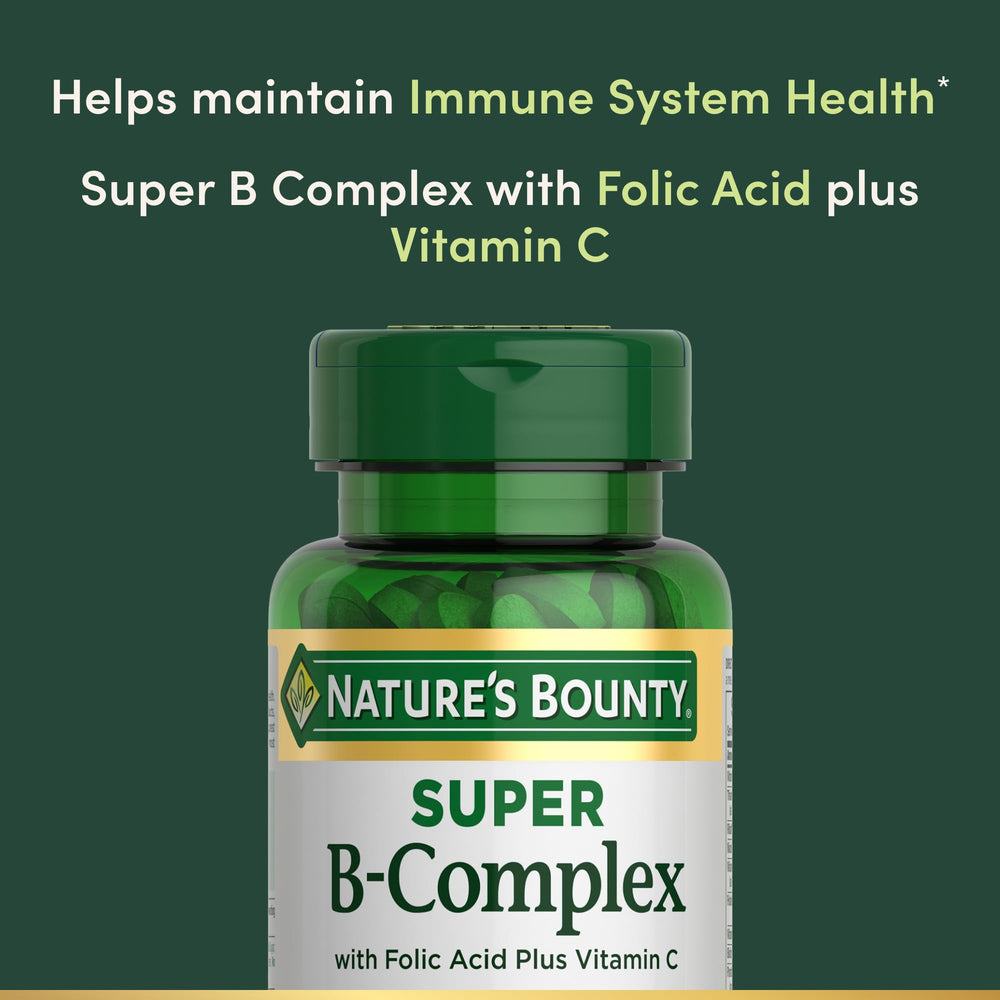 Closeup of Nature's Bounty Super B-Complex tablets emphasizing B vitamins for metabolism