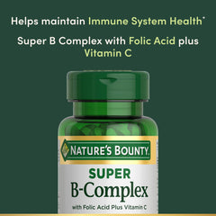 Closeup of Nature's Bounty Super B-Complex tablets emphasizing B vitamins for metabolism