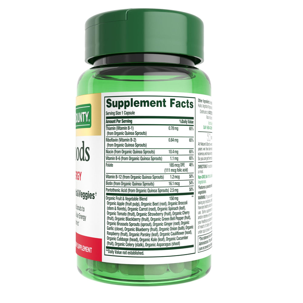 Nature's Bounty Superfoods Plus Energy bottle with water, convenient habit.