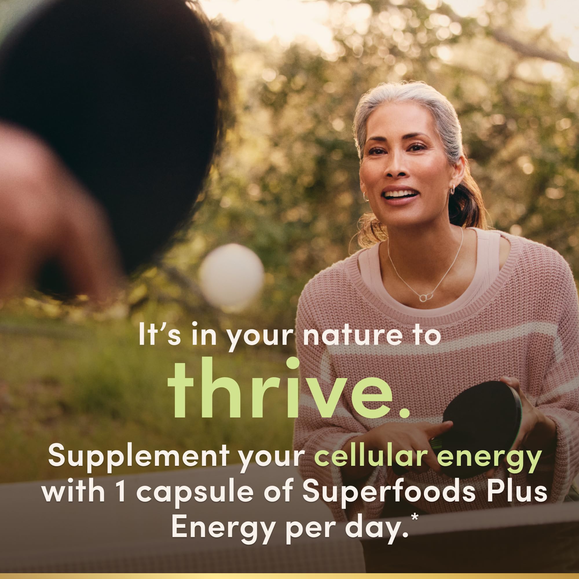 Nature's Bounty Superfoods Plus Energy capsules arranged, simple daily supplement routine.