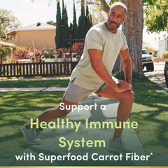 Nature's Bounty Superfoods Plus Immune capsules on table for convenient daily support.