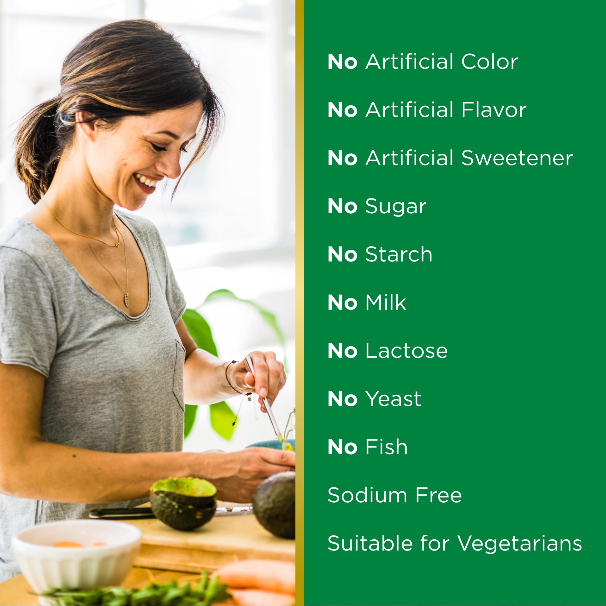 Nature’s Bounty Vitamin E Oil bottle with dosage guidance and measuring drops.