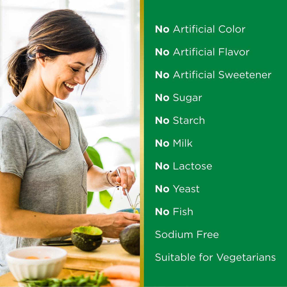Nature’s Bounty Vitamin E Oil bottle with dosage guidance and measuring drops.