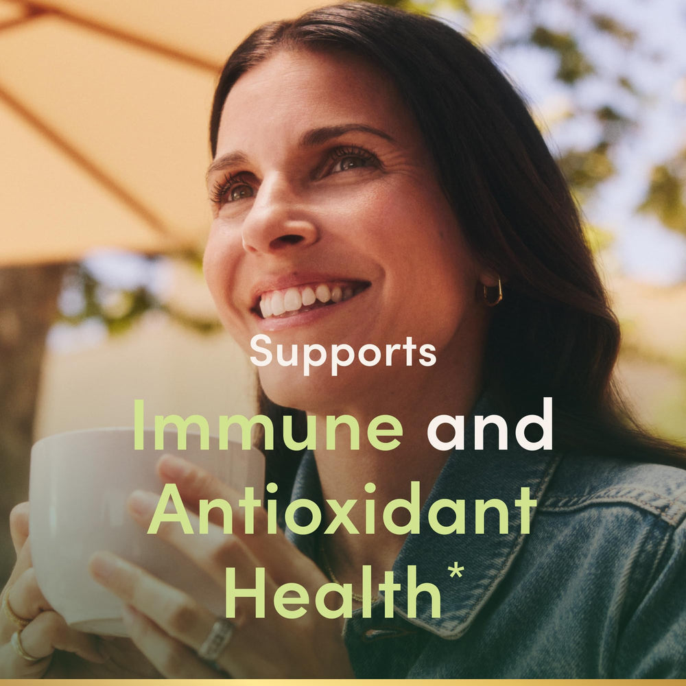 Closeup of Nature's Bounty Vitamin E softgels highlights pure dl-alpha formulation.