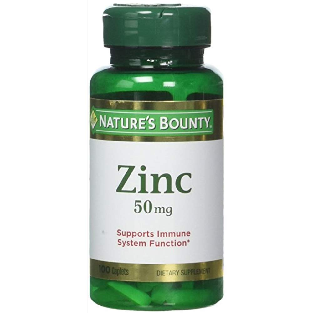 Nature's Bounty Zinc 50 mg caplets bottle-label close-up shows non-GMO and gluten-free formula.