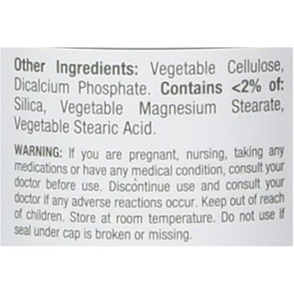 Nature's Bounty Zinc 50 mg caplets on a kitchen counter implies taking one caplet daily with meals.