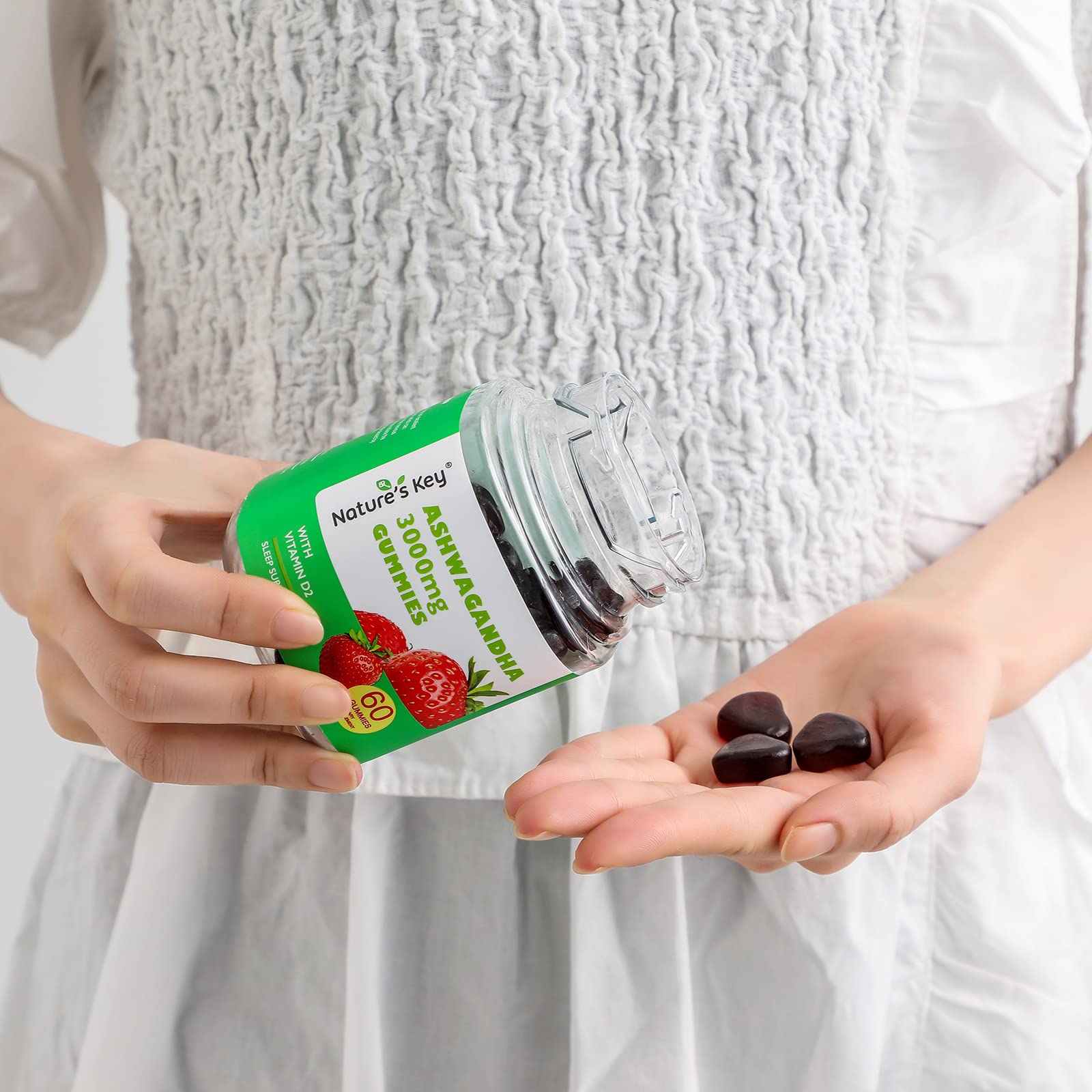 Nature's Key Ashwagandha Gummies strawberry flavor shown as part of daily routine.