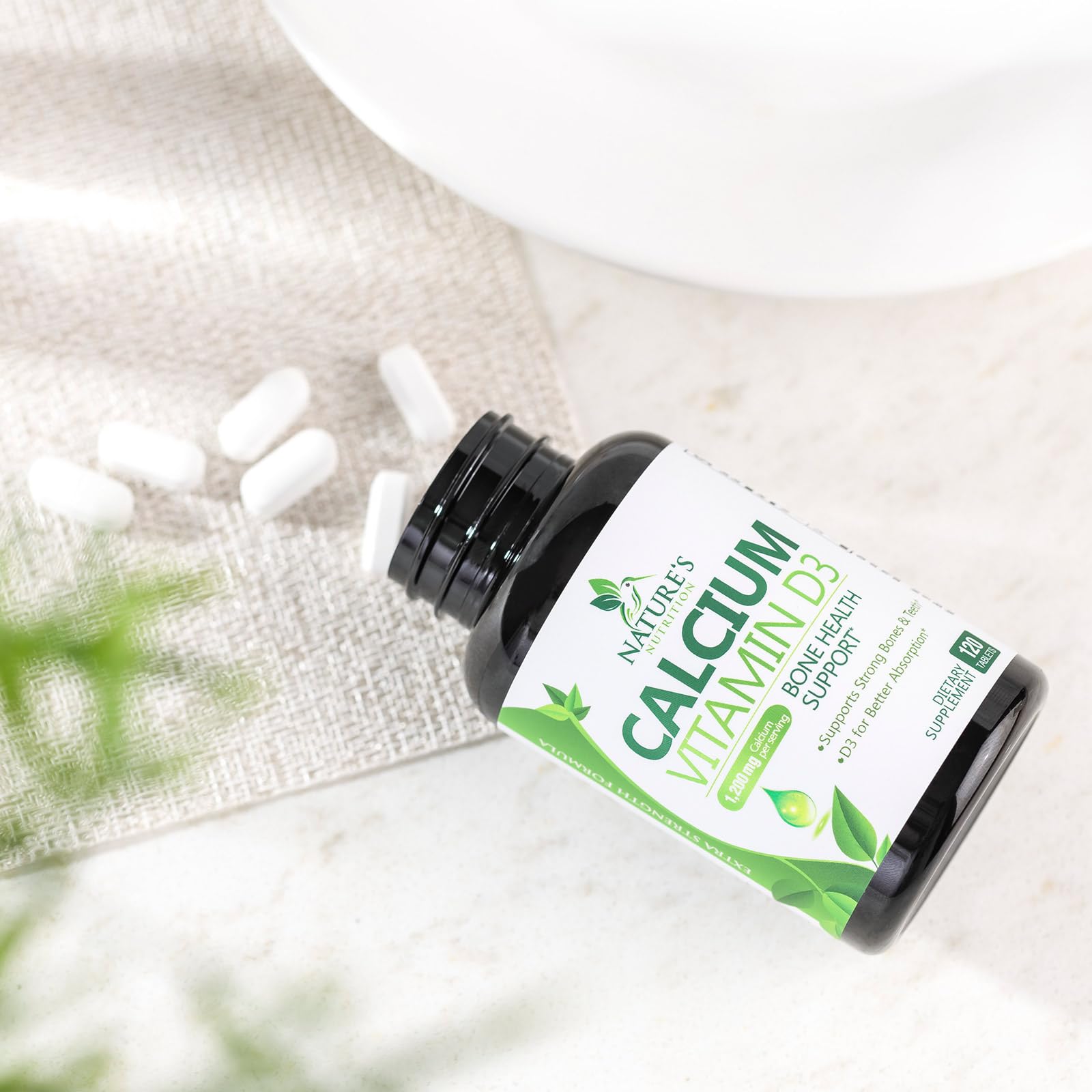 Hands holding calcium tablets ready for daily use