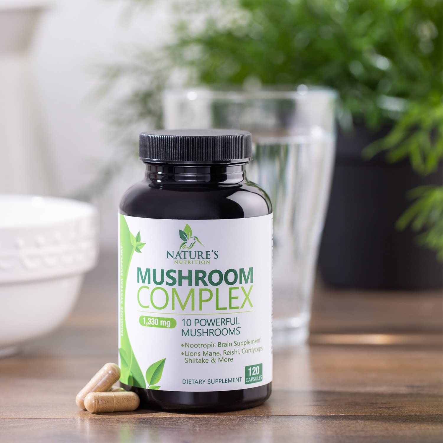 Nature's Nutrition capsules on table illustrating daily defense and immune support
