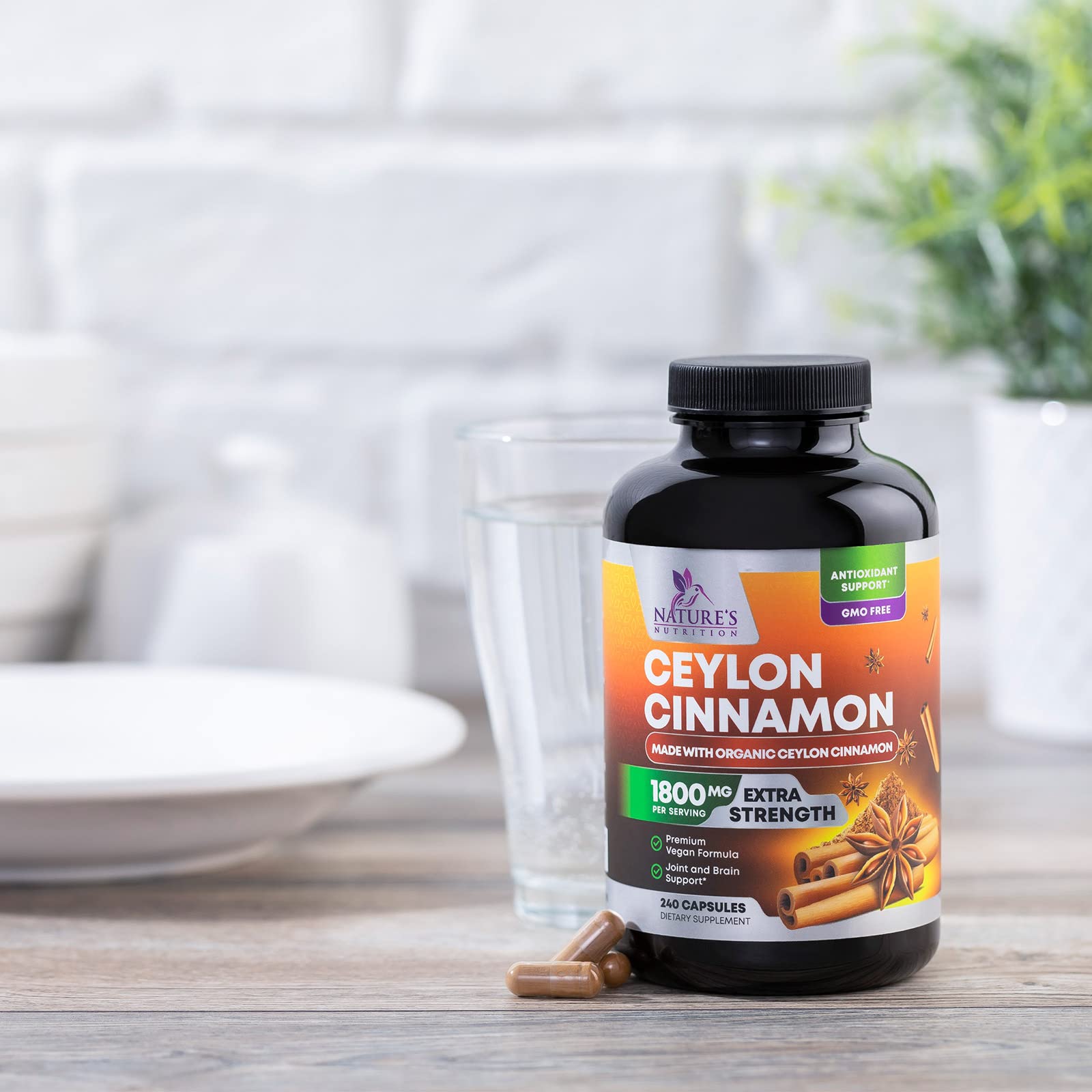 Cinnamon capsules poured from bottle ready for daily routine