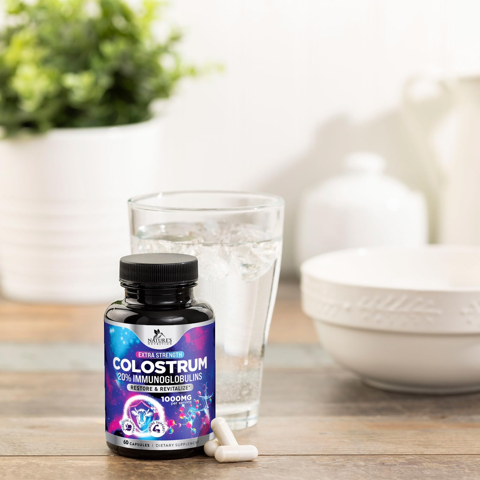 Nature's Nutrition Colostrum powder glass jar underscores storage and freshness.