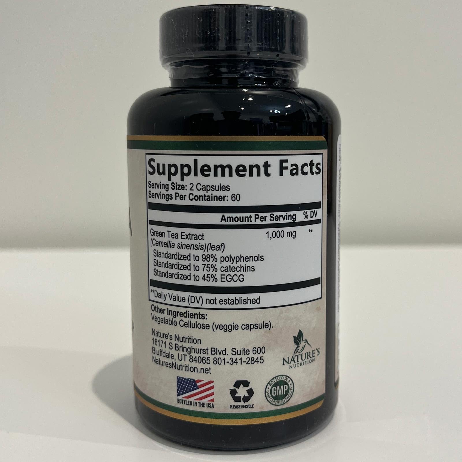 GMP-certified USA production badge on Nature's Nutrition bottle.