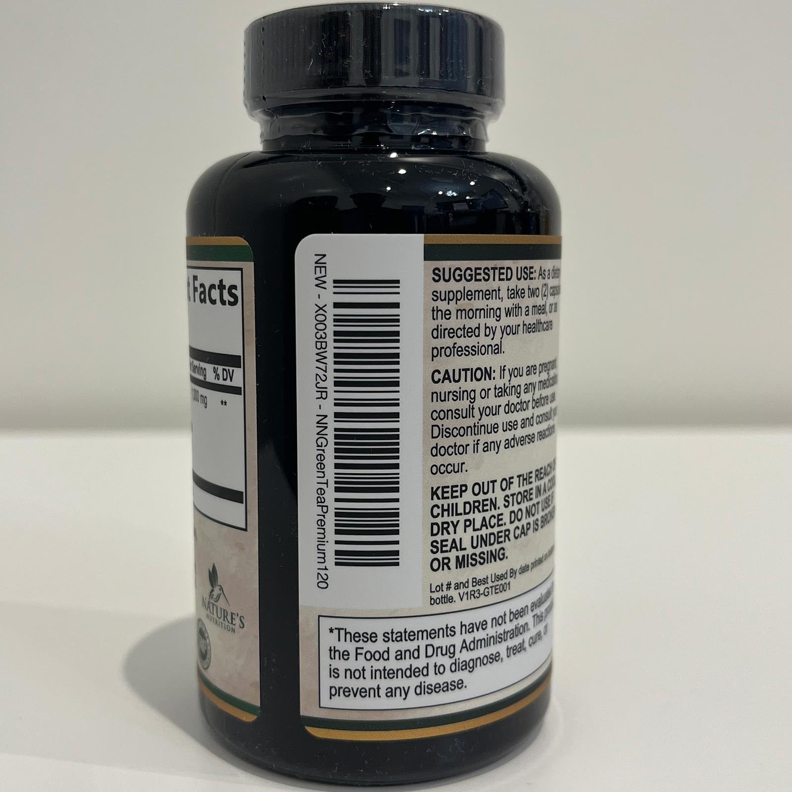 Nature's Nutrition green tea pills supporting metabolism-friendly energy during workouts.