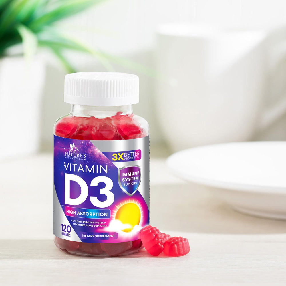Nature's Nutrition Vitamin D3 Gummies beside a glass of water.
