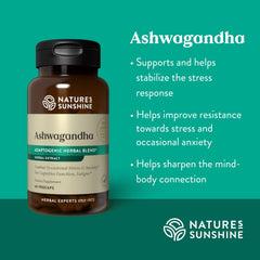 Person holding Nature's Sunshine Ashwagandha capsules for everyday use