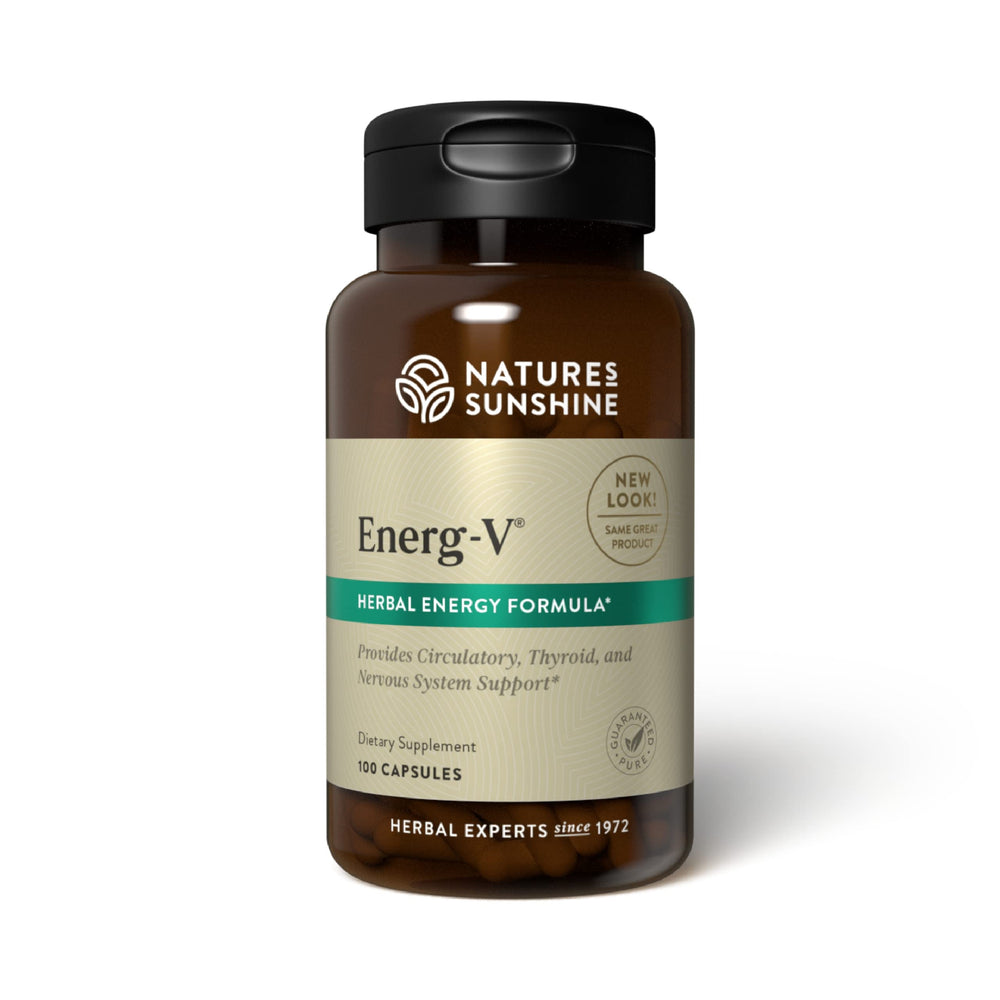 Nature's Sunshine Energ-V 100 capsules bottle on desk suggests energy support