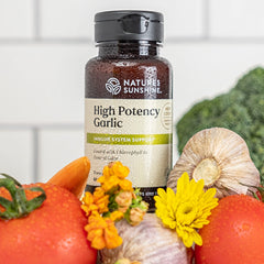 Garlic tablets with odor-control coating and chlorophyll visible on Nature's Sunshine packaging