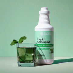 Nature's Sunshine Liquid Chlorophyll drops dispensing for easy daily use.